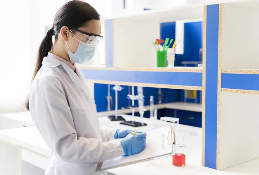 Technicians preparing laboratory space in Oman for equipment installation including electrical setup, ventilation systems, and workspace arrangement